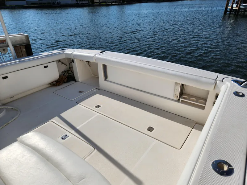 Slide: The Image of Spacious deck of 2004 Tiara Yachts 38 Open, overlooking calm waters. - 7