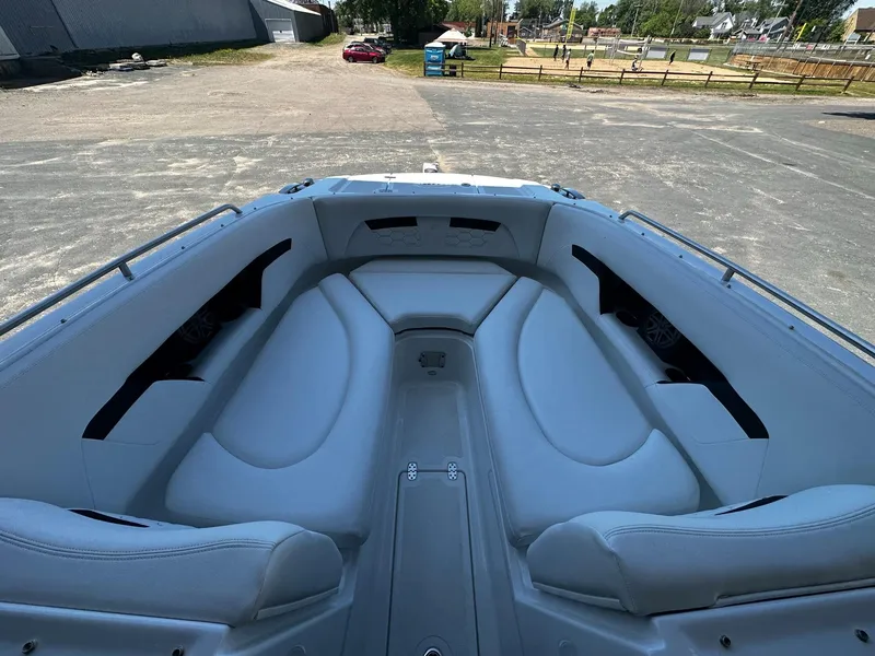 Slide: The Image of 2023 Four Winns HD8 OB boat interior with spacious seating. - 19
