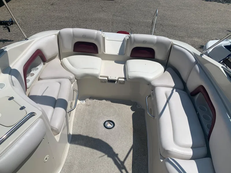 Slide: The Image of 2004 Crownline 270 BR boat interior with spacious seating area. - 20