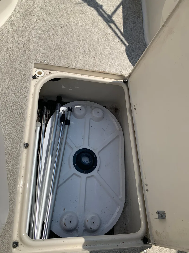 Slide: The Image of Storage compartment of a 2004 Crownline 270 BR boat. - 43