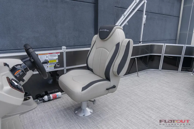 Slide: The Image of Captain's chair on 2023 South Bay L-Lounge Tri-Toon 150HP pontoon boat. - 14