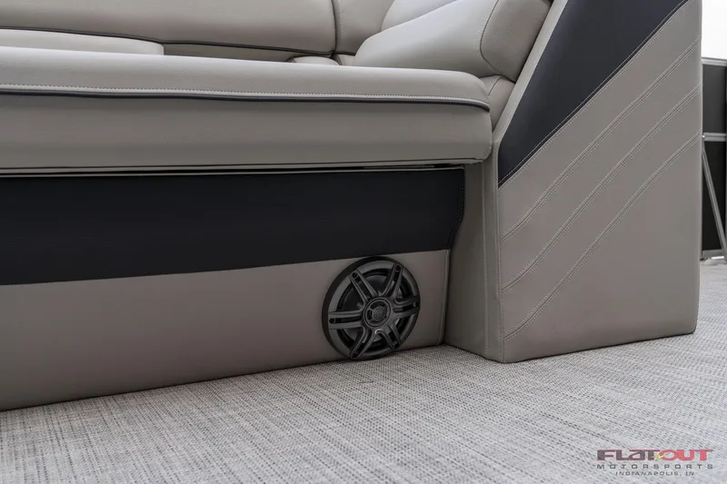 Slide: The Image of 2023 South Bay L-Lounge Tri-Toon 150HP boat interior seating and speaker. - 33