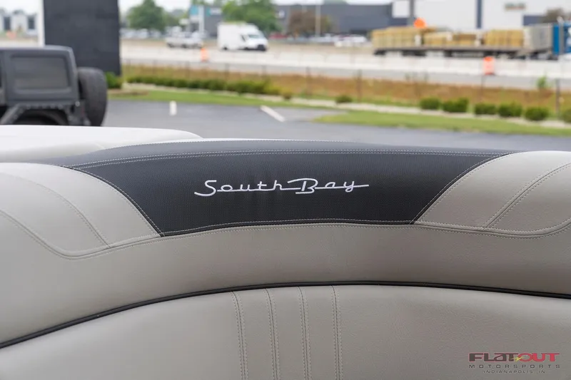 Slide: The Image of 2023 South Bay L-Lounge Tri-Toon 150HP boat seat with logo. - 8
