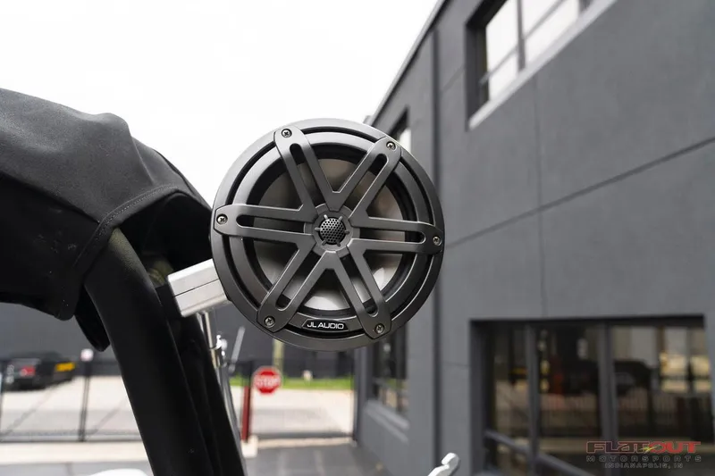 Slide: The Image of 2023 Scarab 215 ID boat with JL Audio speaker system. - 10