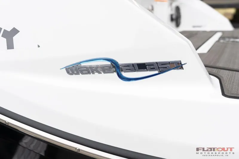 Slide: The Image of 2023 Scarab 215 ID boat with Wake Blast logo. - 14