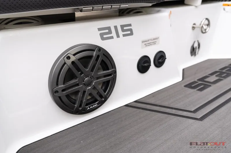 Slide: The Image of 2023 Scarab 215 ID boat with JL Audio speaker and control panel. - 21