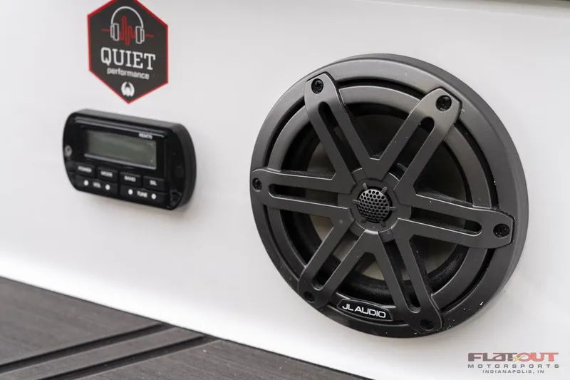 Slide: The Image of 2023 Scarab 215 ID boat audio system featuring JL Audio speaker and control panel. - 22