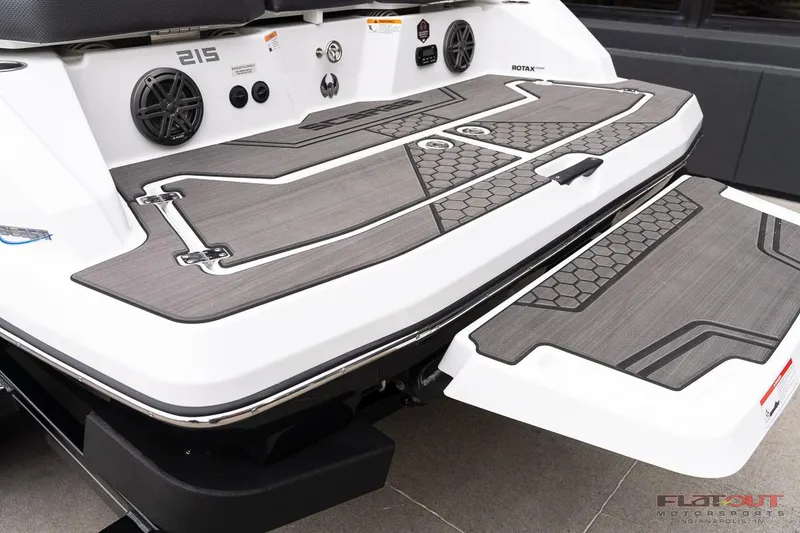 Slide: The Image of 2023 Scarab 215 ID boat rear deck with speakers and swim platform. - 3