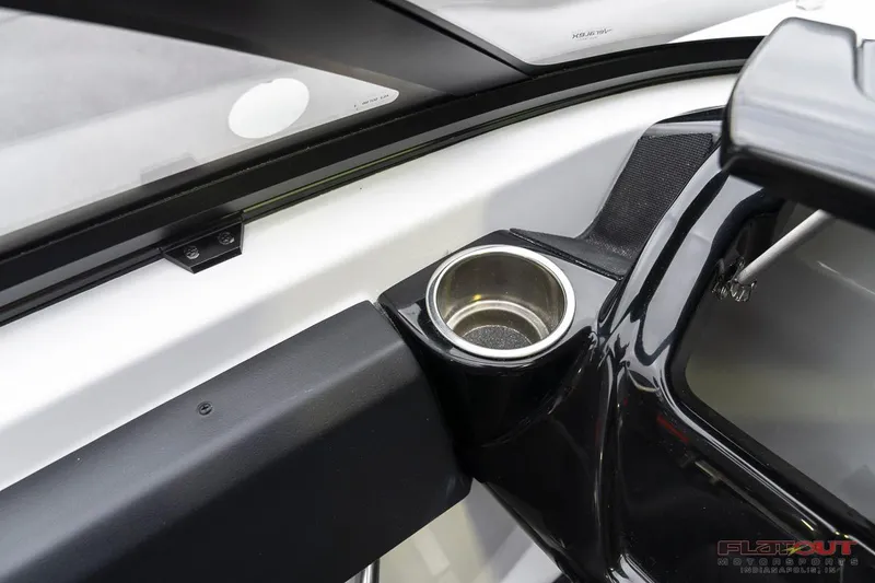 Slide: The Image of 2023 Scarab 215 ID boat interior with cup holder. - 31
