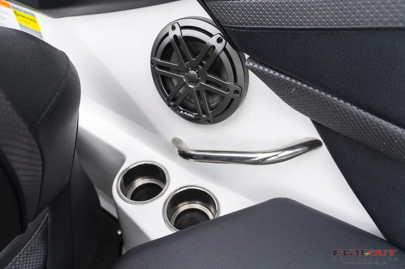 Slide: The Image of 2023 Scarab 215 ID boat interior with speaker and cup holders. - 7