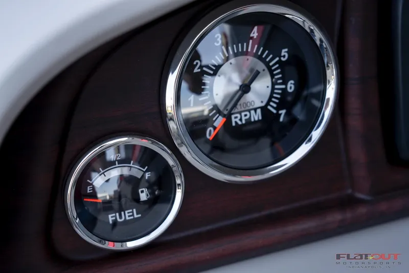 Slide: The Image of Close-up of 2023 South Bay 224RSLE275 boat fuel and RPM gauges. - 10