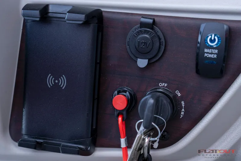 Slide: The Image of Control panel of 2023 South Bay 224RSLE275 with power switch and key ignition. - 12