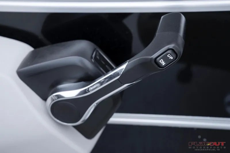 Slide: The Image of Close-up of 2023 South Bay 224RSLE275 boat throttle control. - 13
