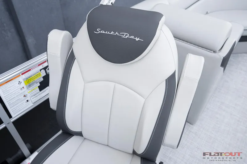 Slide: The Image of 2023 South Bay 224RSLE275 boat seat with logo, white and gray upholstery. - 14