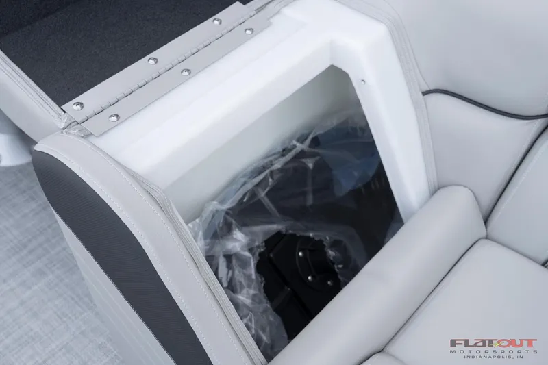 Slide: The Image of 2023 South Bay 224RSLE275 boat storage compartment with cushioned seating. - 26