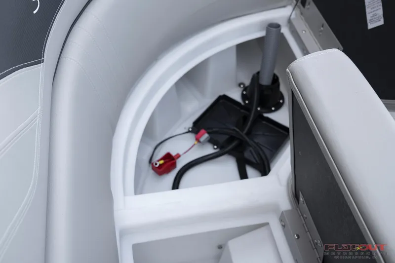 Slide: The Image of 2023 South Bay 224RSLE275 boat storage compartment with wiring and battery. - 27
