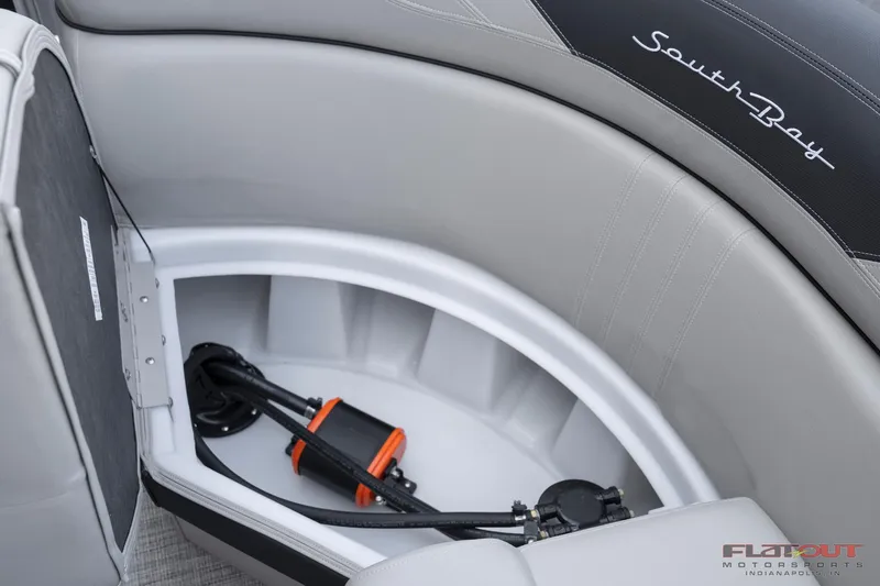 Slide: The Image of 2023 South Bay 224RSLE275 boat storage compartment with equipment. - 6