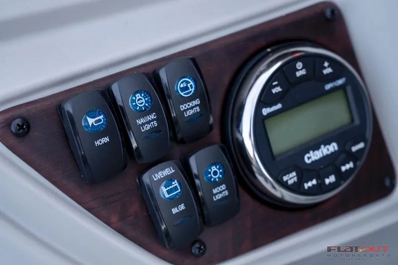 Slide: The Image of Control panel of 2023 South Bay 224RSLE275 boat with Clarion audio system. - 9