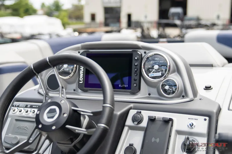 Slide: The Image of 2023 South Bay 525 3.0 Entertain 200HP boat dashboard with Lowrance Elite display. - 10