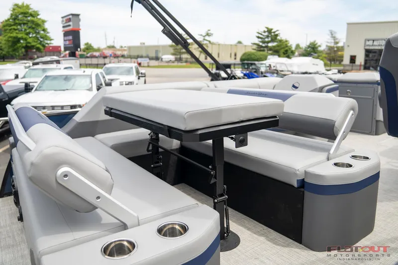 Slide: The Image of 2023 South Bay 525 3.0 Entertain 200HP pontoon boat interior with seating and table. - 14