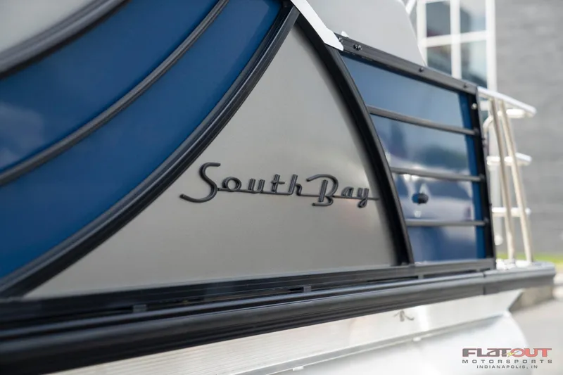 Slide: The Image of 2023 South Bay 525 3.0 Entertain 200HP boat, close-up of logo and design. - 18