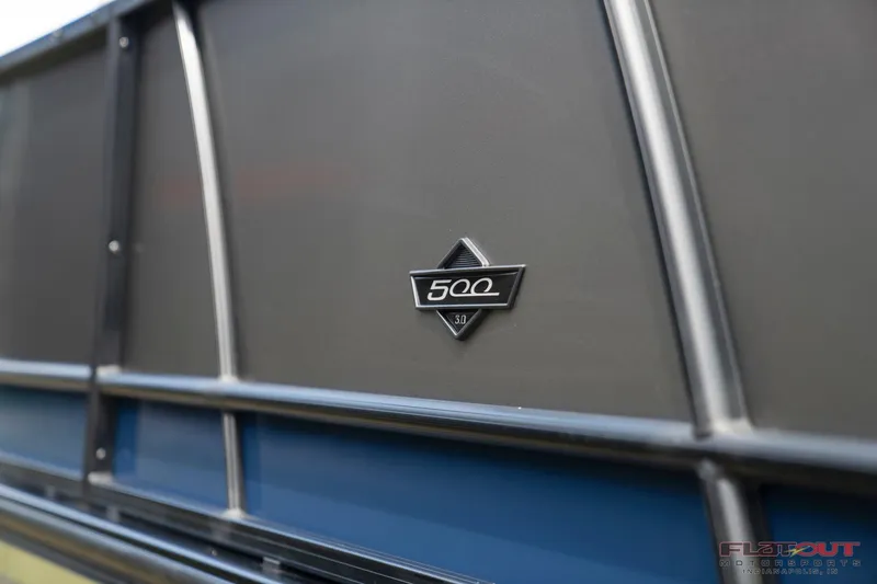 Slide: The Image of Close-up of 2023 South Bay 525 3.0 Entertain 200HP emblem. - 21