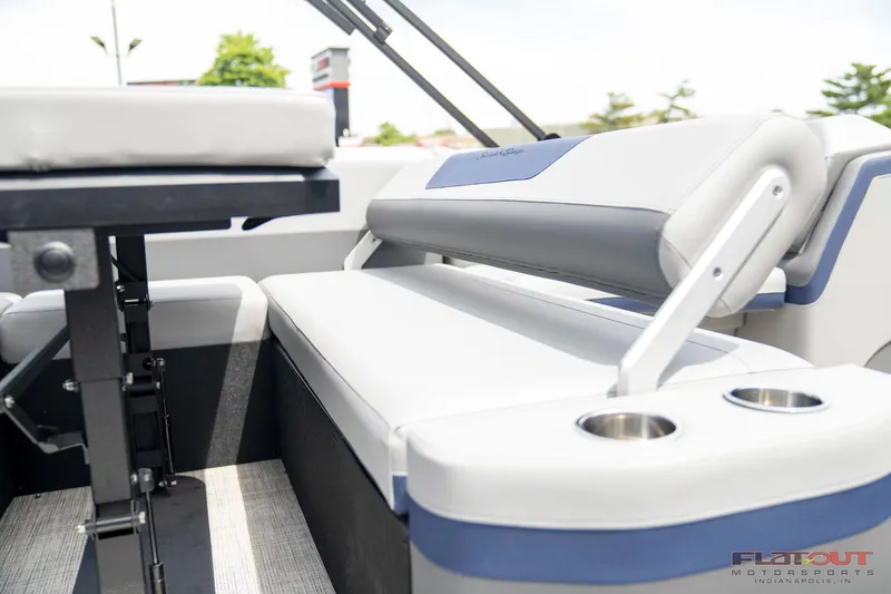 Slide: The Image of 2023 South Bay 525 3.0 Entertain 200HP boat interior seating and table. - 25