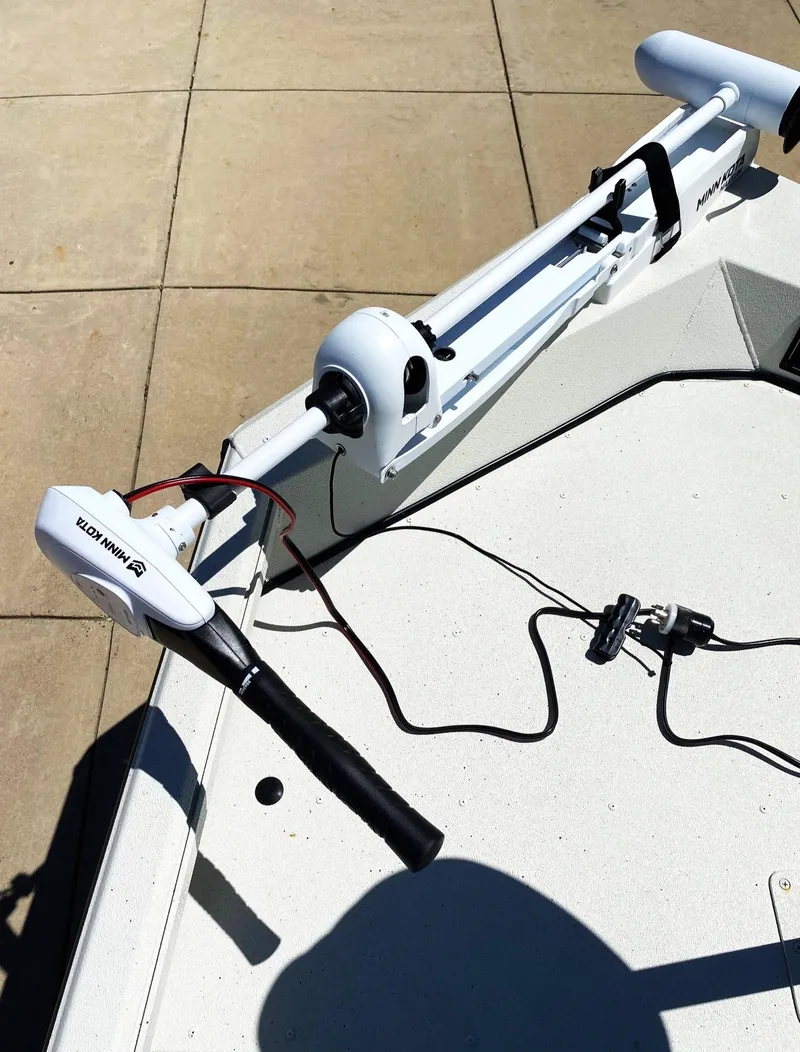 Slide: The Image of 2023 Ranger RB190 boat with mounted trolling motor on deck. - 12