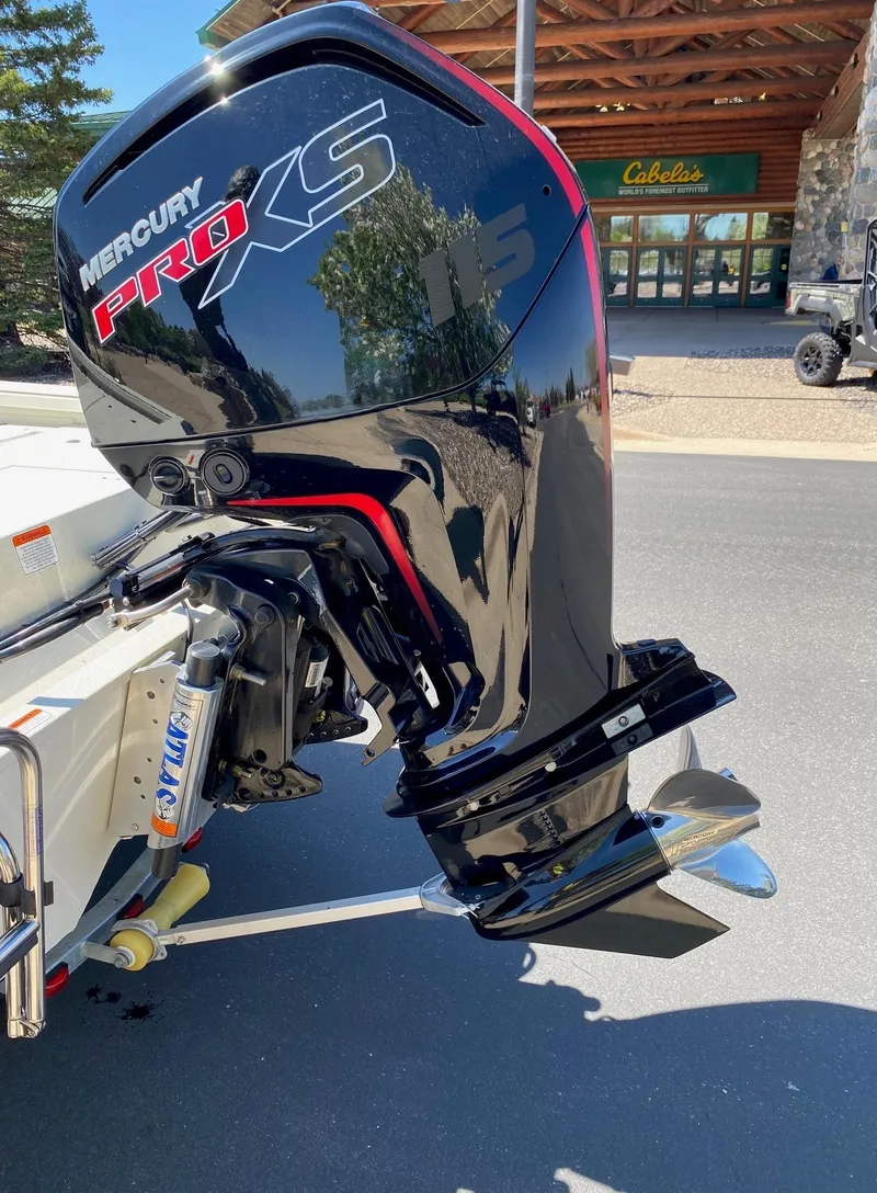 Slide: The Image of 2023 Ranger RB190 boat with Mercury Pro XS outboard motor in a parking lot. - 14