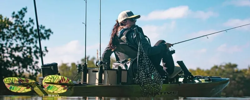 Slide: The Image of Person fishing on a 2023 Native Watercraft SLAYER PROPEL 10 MAX kayak. - 8