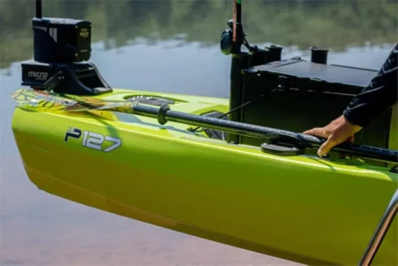 Slide: The Image of 2023 Bonafide P127 kayak in green on a calm lake. - 4