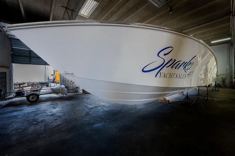 Slide: The Image of Four Mercury 400 V10 outboard engines on a Sparks 46 boat, 2026 model. - 10