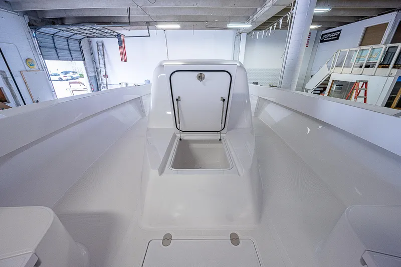 Slide: The Image of 2023 Sparks 46 boat interior under construction in a warehouse. - 20