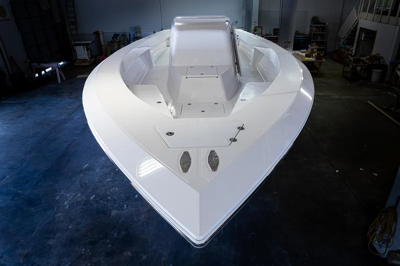 Slide: The Image of Sparks 46 boat interior, 2023 model, in a warehouse. - 23