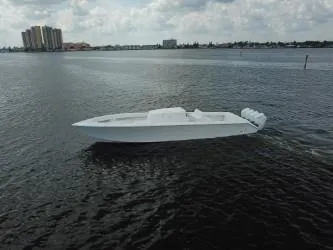 Slide: The Image of Sparks 46 boat cruising on open water, 2025 model. - 62