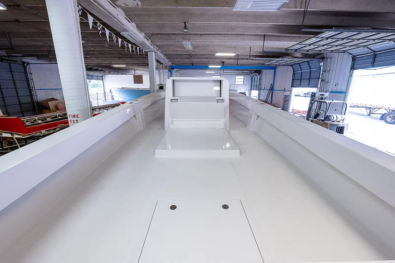 Slide: The Image of 2023 Sparks 46 boat interior in a warehouse. - 69