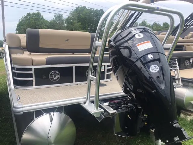 Slide: The Image of 2023 Starcraft EX 24 Q pontoon boat with outboard motor. - 3