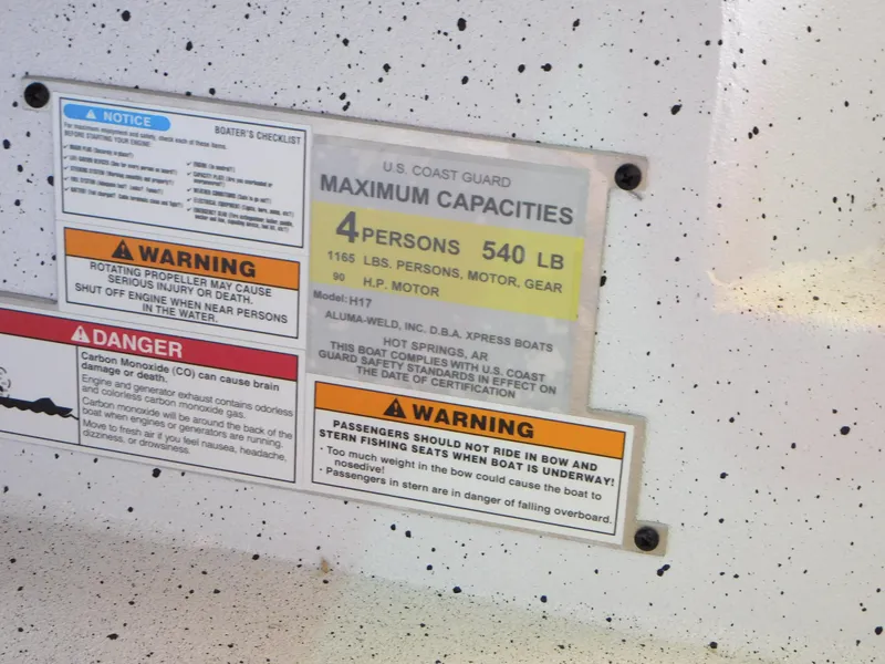 Slide: The Image of 2023 Xpress H17 boat capacity and safety warning labels - 7