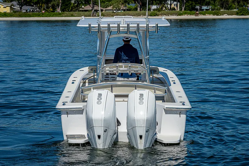 Slide: The Image of 2020 Birdsall 30 CC boat with dual engines on calm water. - 13