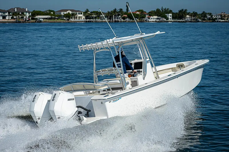 Slide: The Image of 2020 Birdsall 30 CC boat cruising on water with dual engines. - 20