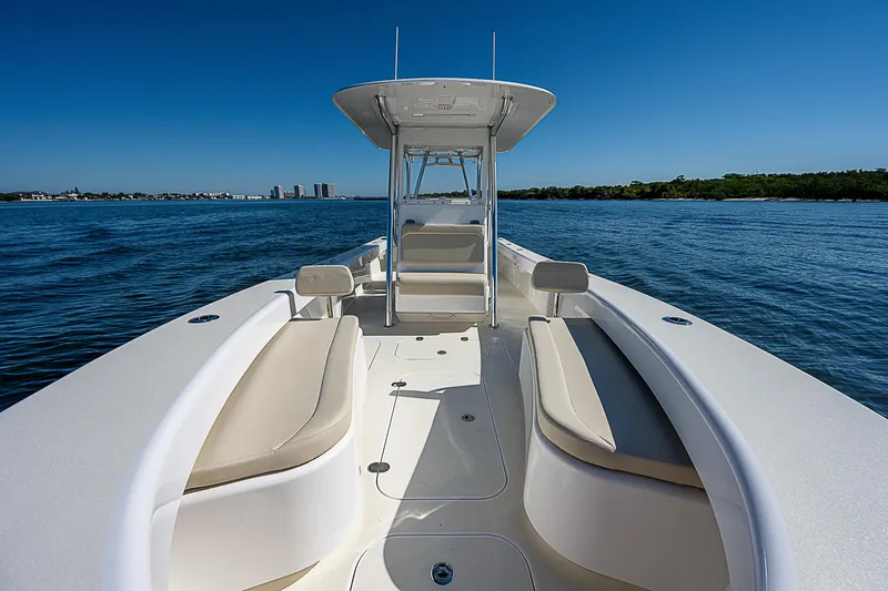 Slide: The Image of 2020 Birdsall 30 CC boat on calm water, featuring sleek design and spacious seating. - 24