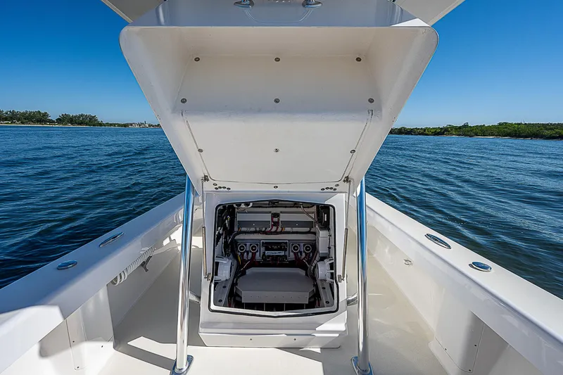 Slide: The Image of 2020 Birdsall 30 CC boat interior with open console, on calm blue water. - 26