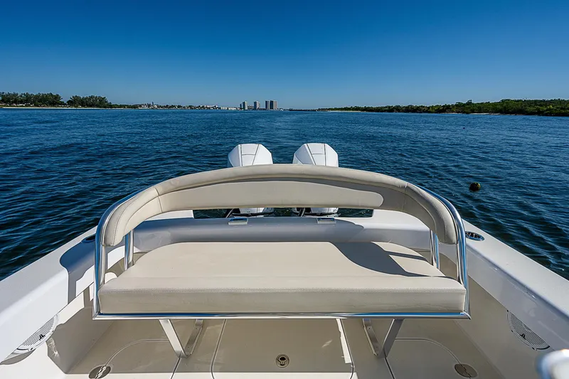 Slide: The Image of 2020 Birdsall 30 CC boat on calm water, featuring a sleek seating area. - 27