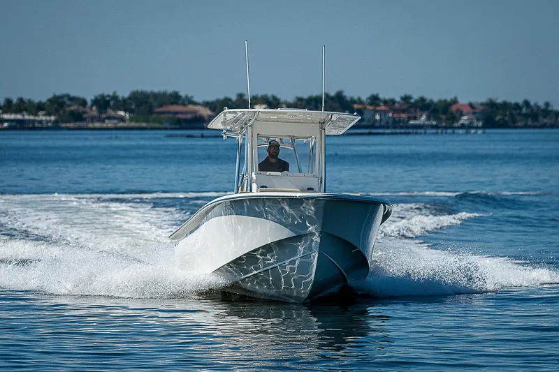 Slide: The Image of 2020 Birdsall 30 CC boat cruising on calm blue water. - 36