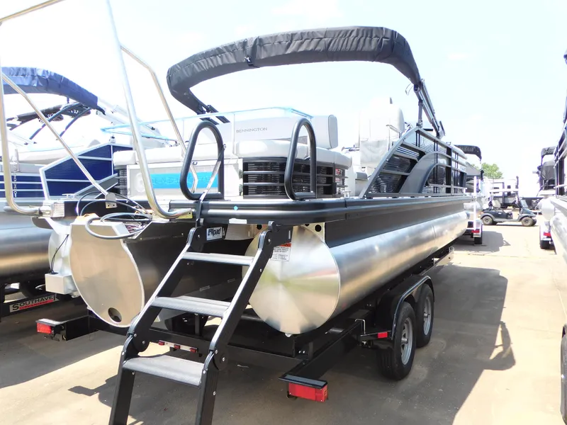 Slide: The Image of 2023 Bennington 24 LXSB pontoon boat on trailer, rear view. - 3