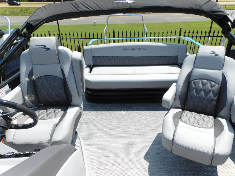 Slide: The Image of 2023 Bennington 24 LXSB boat interior with luxurious seating and modern design. - 9