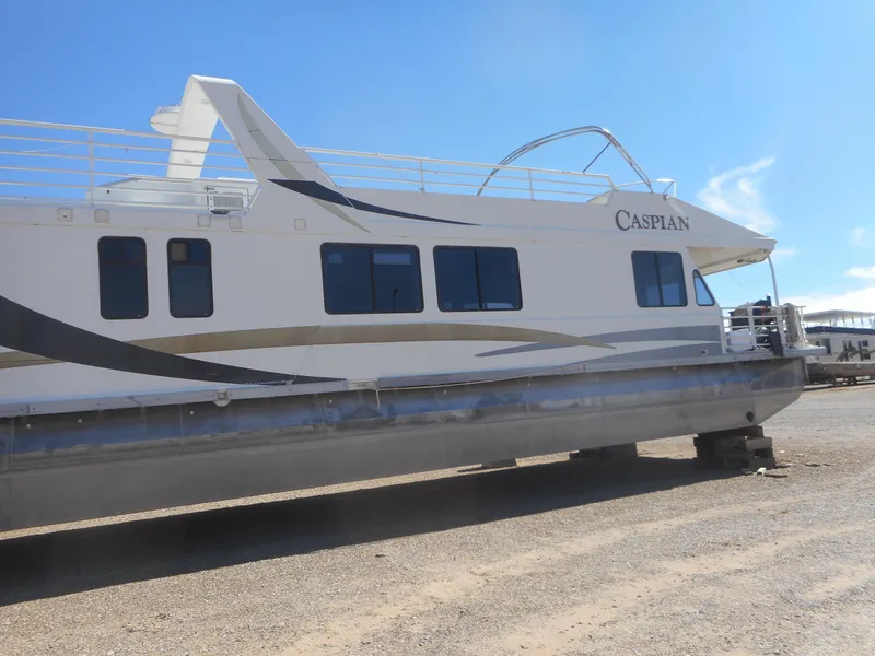 Slide: The Image of 2005 Twin Anchors Caspian share #9 houseboat on dry land. - 2