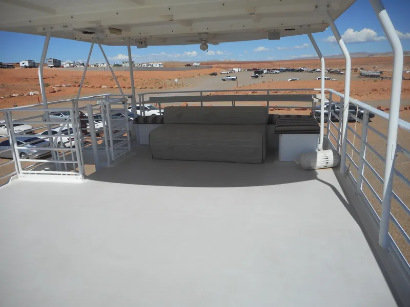 Slide: The Image of Upper deck of 2005 Twin Anchors Caspian Share #9 houseboat with seating area. - 26