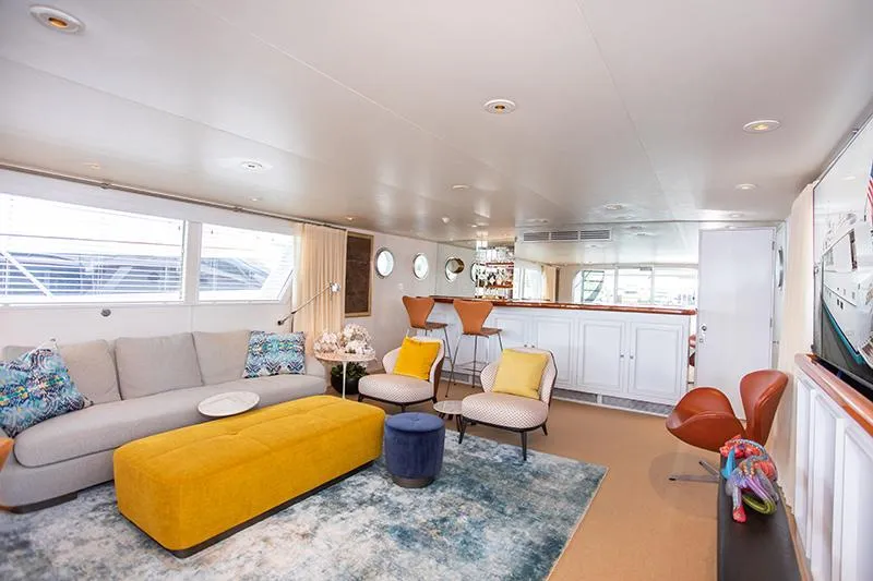 Slide: The Image of Luxurious interior of a 1966 Burger Classic yacht with modern kitchen and dining area. - 11