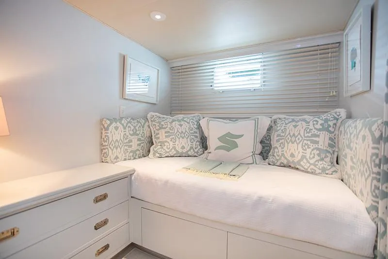 Slide: The Image of Modern bathroom with blue walls, mirrored cabinets, granite countertop, and glass shower. - 23